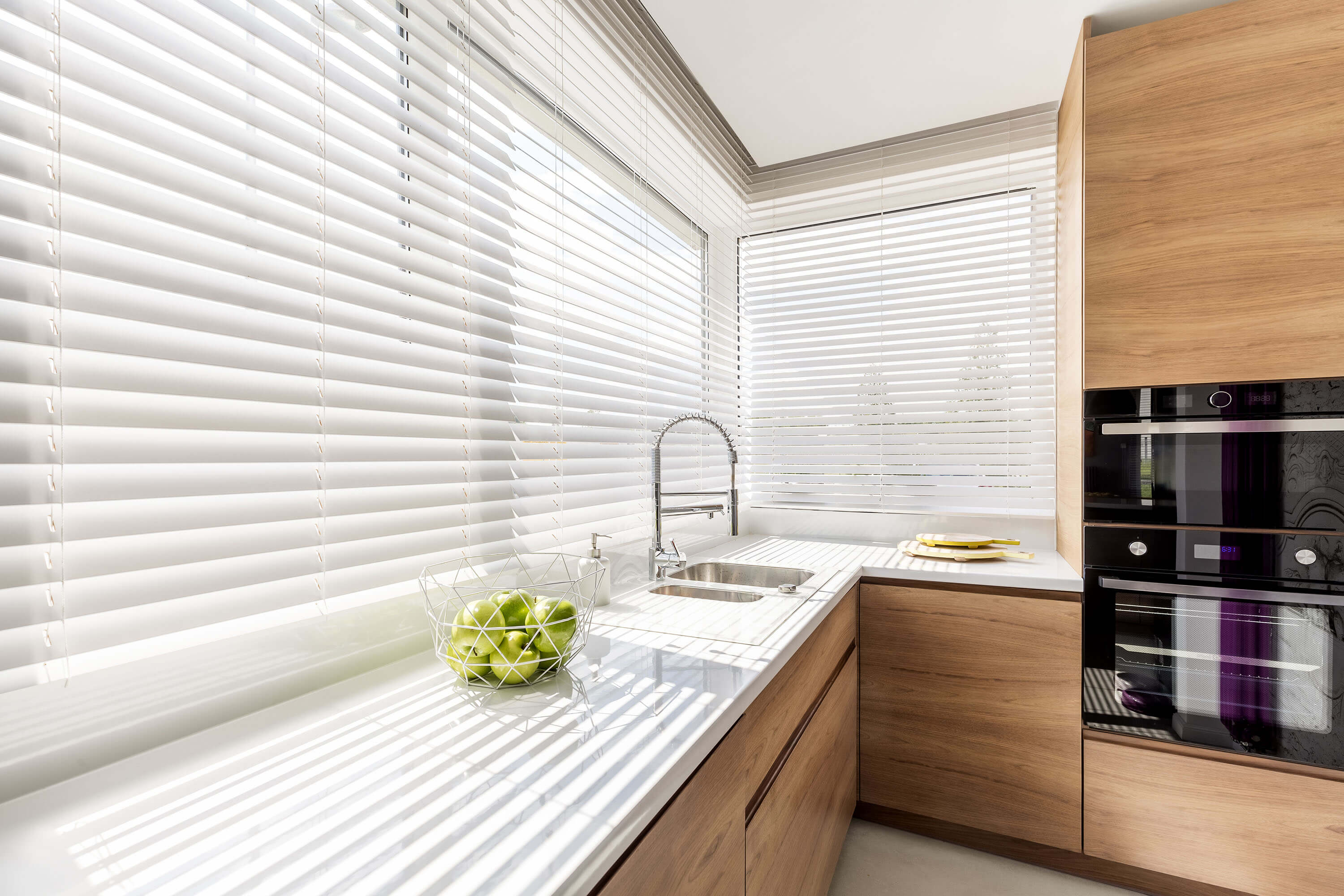 Faux Wood Classic Replica cordless blinds in the color white.