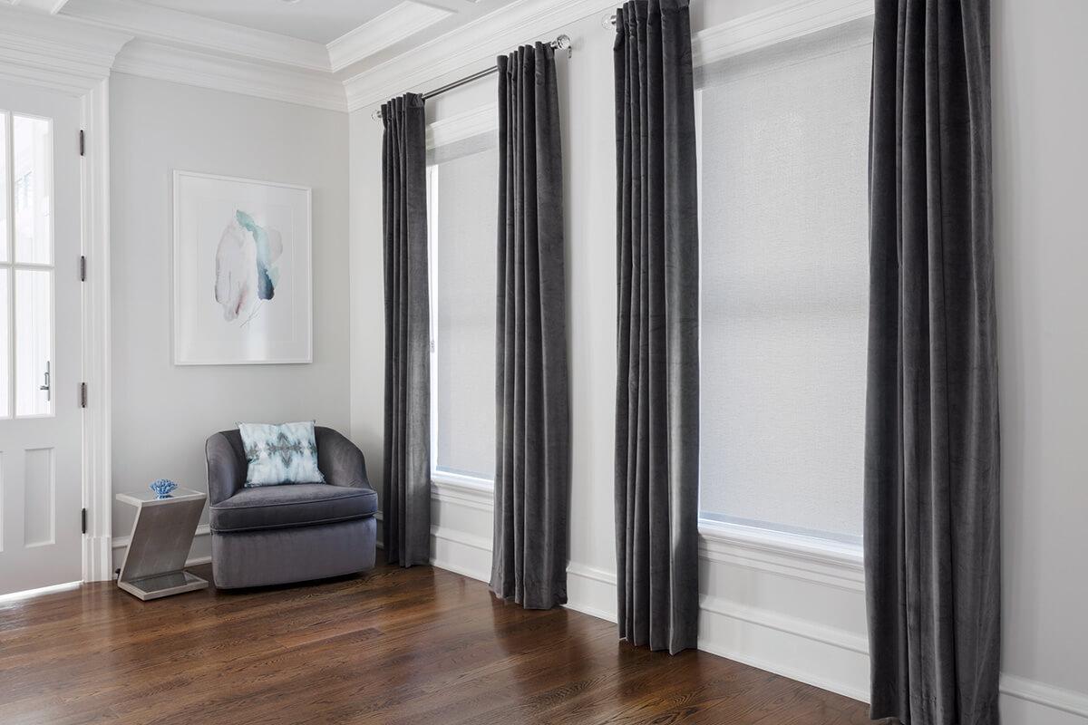 Velvet Luxe : Shadow drapes with Amazon Roller shade in the entrance windows.