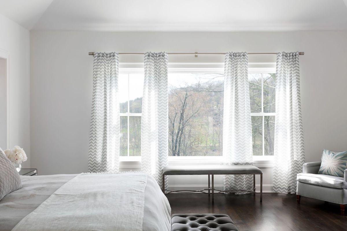 Beautiful drapery window treatment showcasing classical flare.