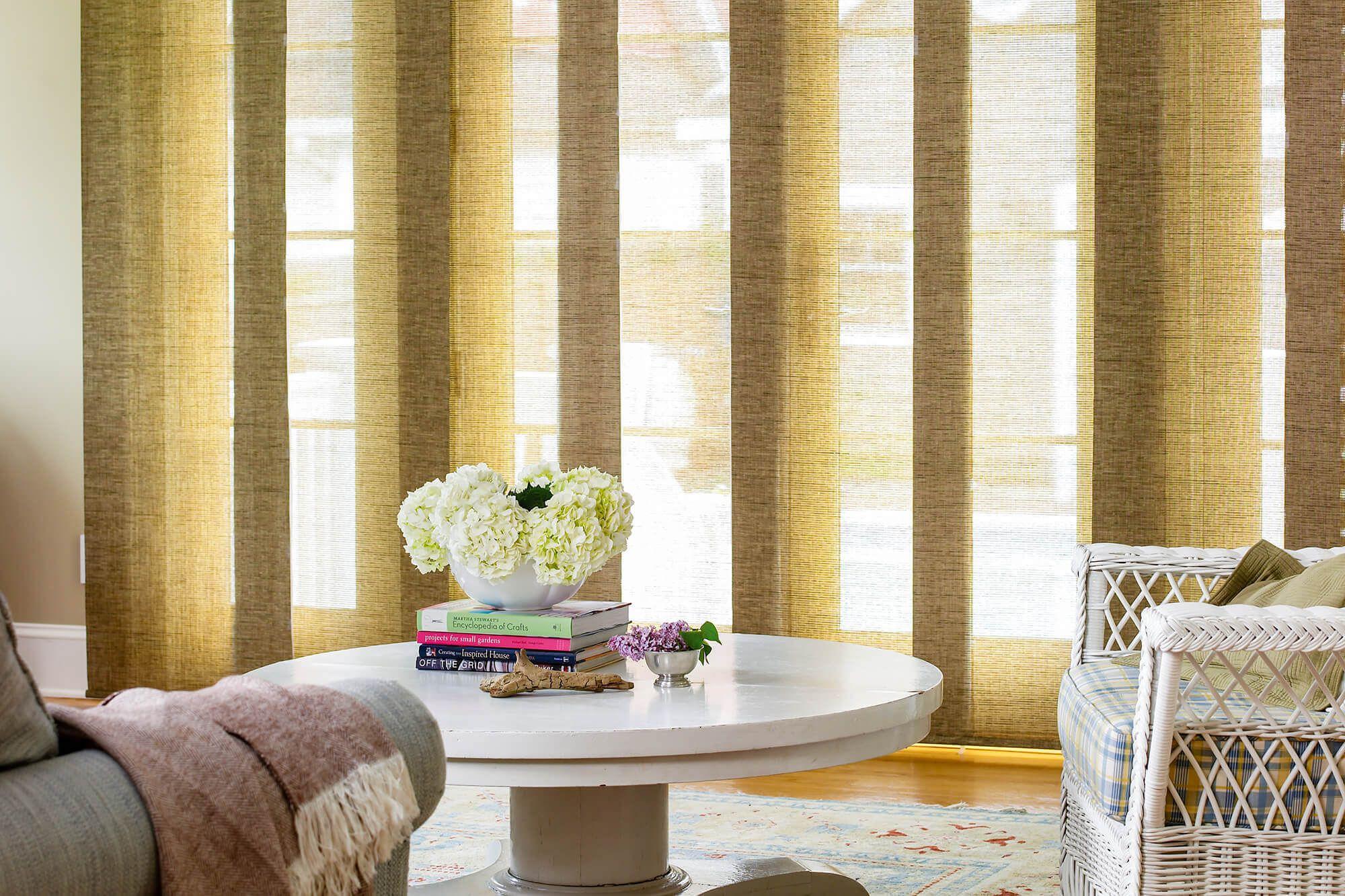 Warm sunlight filters through modern & eco-friendly solar panel tracks in stylish living room.