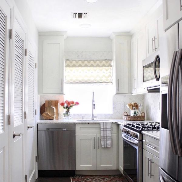 Cozy and modern Roman shades in a small kitchen