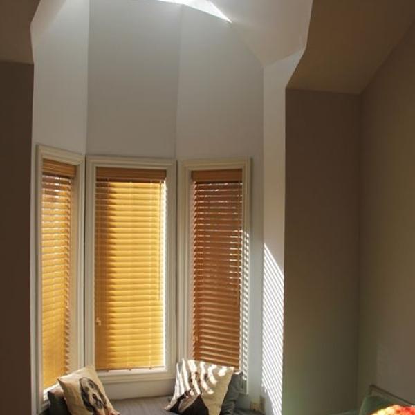 Wooden blinds on a bay window