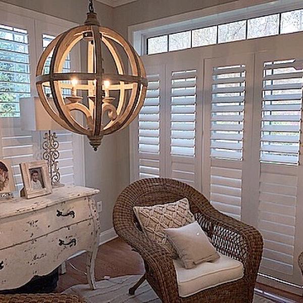 Plantaion shutters in a country chic sitting room