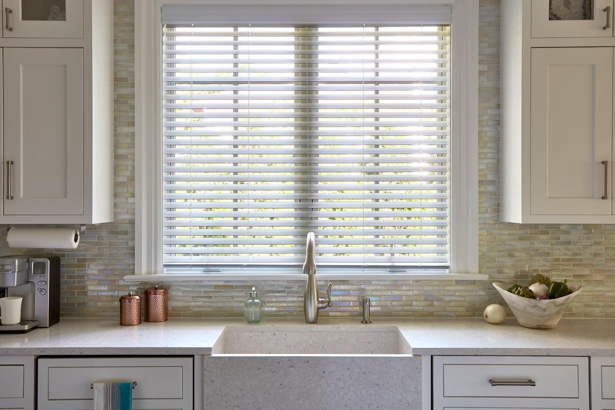 White wood blinds in a modern kitchen White wood blinds in a modern kitchen