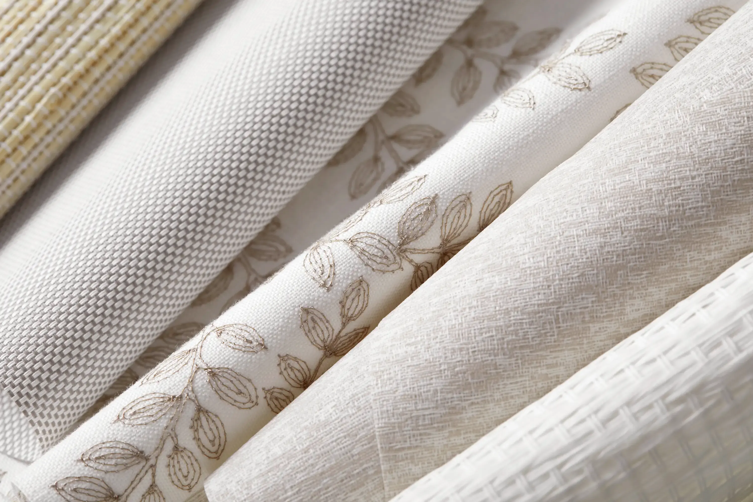 Close-up of premium neutral fabrics and materials