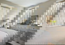 Traditional Bedroom With Modern Blinds